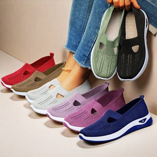 Colorful women's mesh flats shoes with breathable, non-slip soft bottoms displayed on feet and held in hand casual style