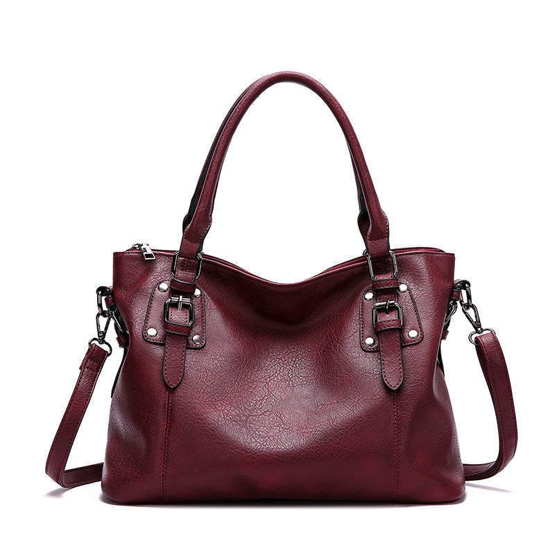 European and American style women's retro large capacity shoulder bag in burgundy polyurethane with soft handle and zipper compartments