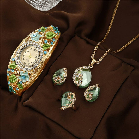 Blue vintage court style elegant women's wrist watch with floral details and matching green jewelry set