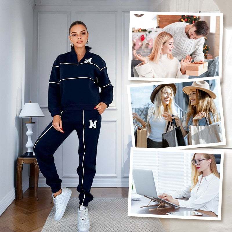 Women 2 piece navy sweatpants and pullover sweat suit with white stripes and letter M design