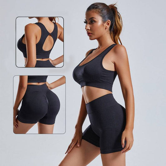 Women wearing black seamless yoga set vest and high waist shorts workout sportswear