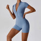 Women's zipper short sleeve yoga jumpsuit in haze blue, tight fit, moisture-wicking fabric