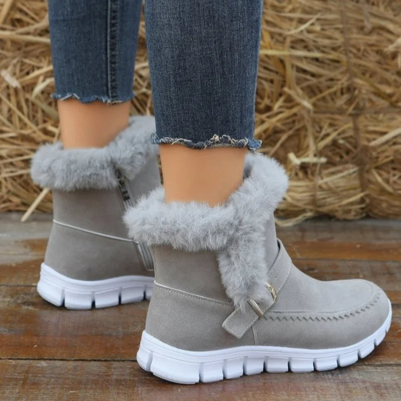 Women's winter snow boots with thick plush ankle cuff and buckle design in gray suede with white rubber sole