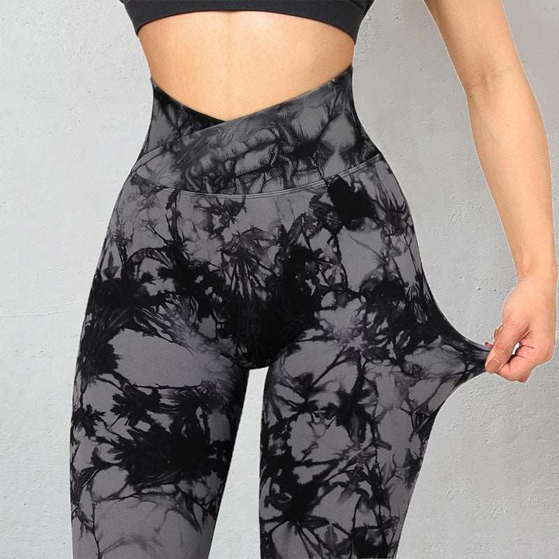 Women's seamless tie dye leggings in black and gray, high-waisted yoga and fitness pants with stretchy fabric.