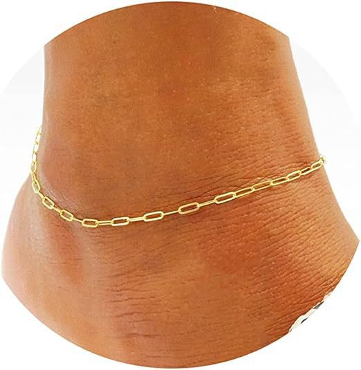Delicate gold chain beach anklet on ankle with rectangular links, women's geometric alloy design with pearls and beads.