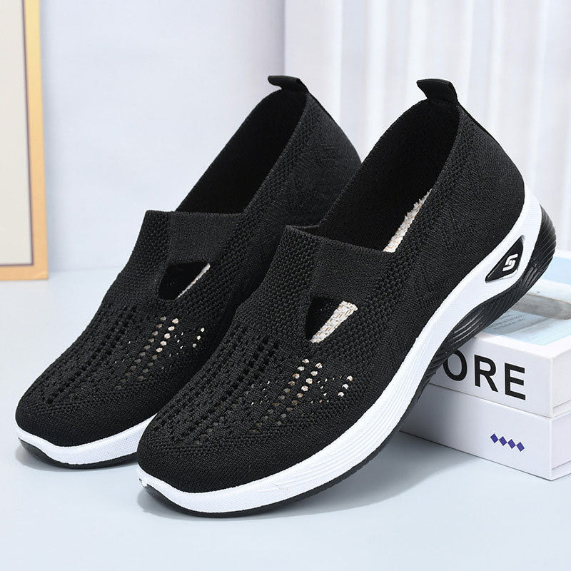 Black summer breathable mesh shoes for children with white sole and slip-on design