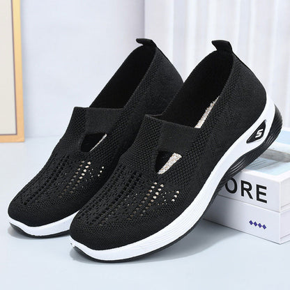 Black summer breathable mesh shoes for children with white sole and slip-on design