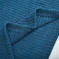 Close-up of blue cotton blend ribbed knit fabric for women's lapel pullover sweater