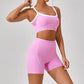 Women's pink outdoor sports yoga suit with spaghetti straps and contrast white trim, fitted fitness set