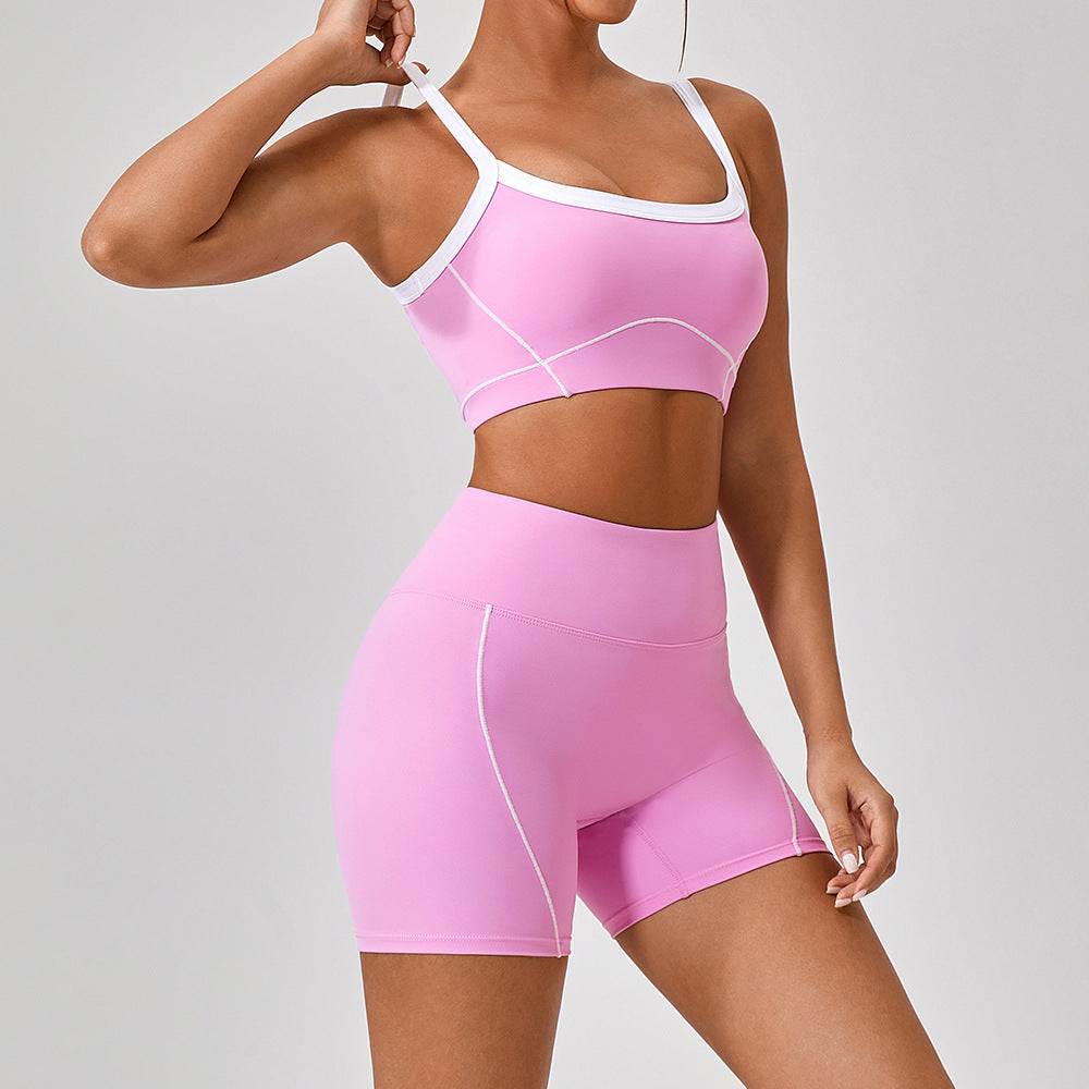 Women's pink outdoor sports yoga suit with spaghetti straps and contrast white trim, fitted fitness set