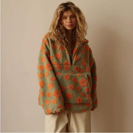 Winter Flowers Lambskin Sweatshirt with orange floral pattern and big front pocket on model