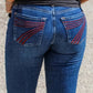 Slim fit elastic mid-waist denim jeans with red embroidery on back pockets, slightly flared design