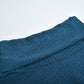 Women's lapel pullover knit sweater in blue cotton blend fabric with ribbed texture and folded collar