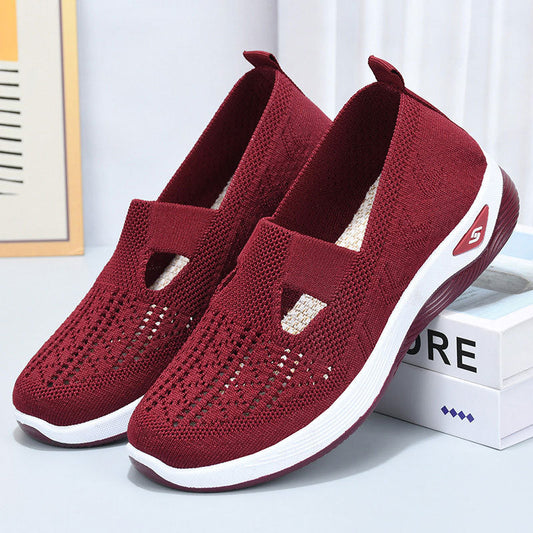 Red breathable mesh summer shoes for women with white sole, casual low-top flat heel sneakers.