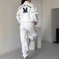 Women 2 piece white lounge outfit with hoodless pullover sweatshirt and baggy sweatpants with pockets