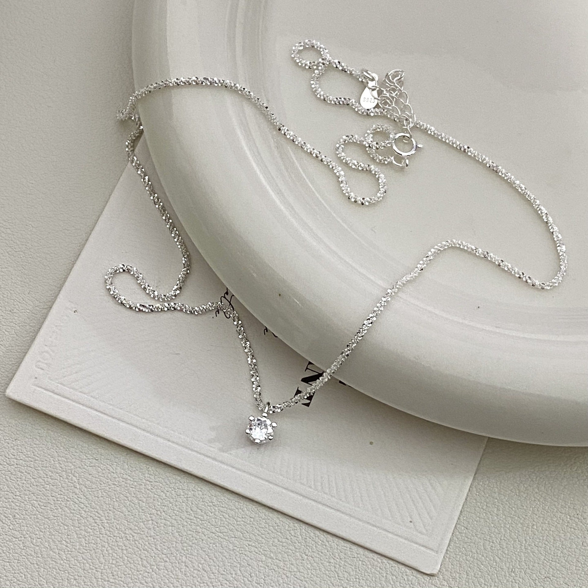 Sparkling Starry Sky S925 silver necklace with white zircon pendant and geometric circular design
