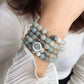 Handmade beaded frosted stone and alloy succulent yoga bracelet on wrist