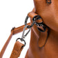 European and American style women's retro brown synthetic leather shoulder bag with embossed texture and soft handle close-up detail