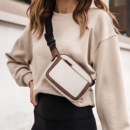 Woman wearing beige and brown fashion chest bag made of artificial leather with adjustable strap
