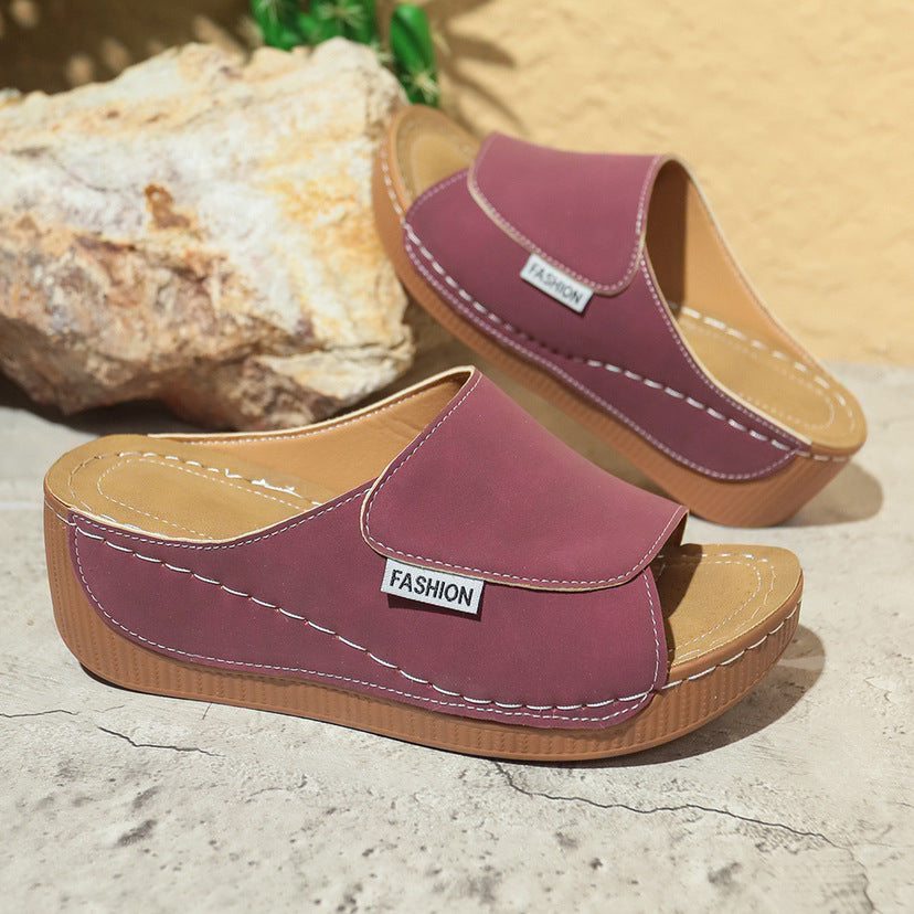 Women’s summer wedge slides slippers in purple with thick brown sole and open fish mouth design