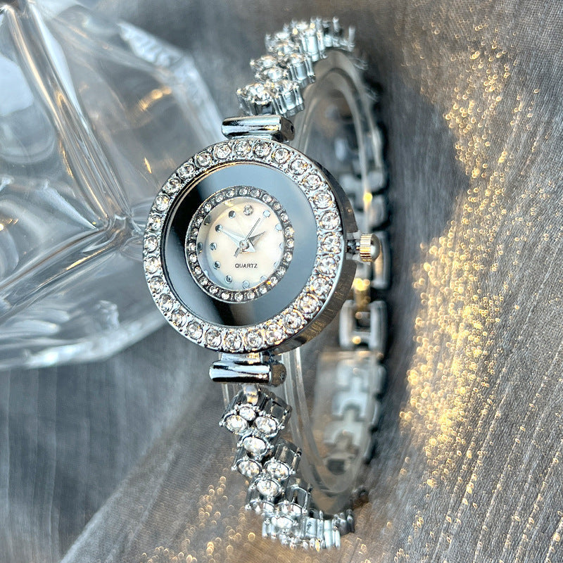 Diamond-encrusted glass rhinestone women's quartz watch in silver with sparkling crystal accents