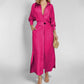 Women's elegant pink tied solid color waisted long-sleeved shirt dress with pockets and asymmetric skirt