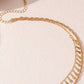 Gold multi-layer braided chain necklace with droplet-shaped tassel pendant for women