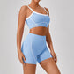 Women’s outdoor sports yoga suit with spaghetti strap top and high-waisted shorts in blue and white contrast color fitness set