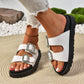 White platform sandals with black sole and rhinestone belt buckles, casual fashion footwear
