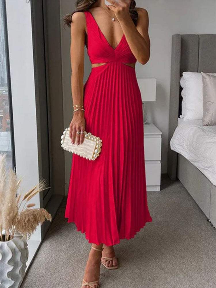 Woman wearing red ins suspender pleated long dress with hollow-waisted design and V-neck backless style
