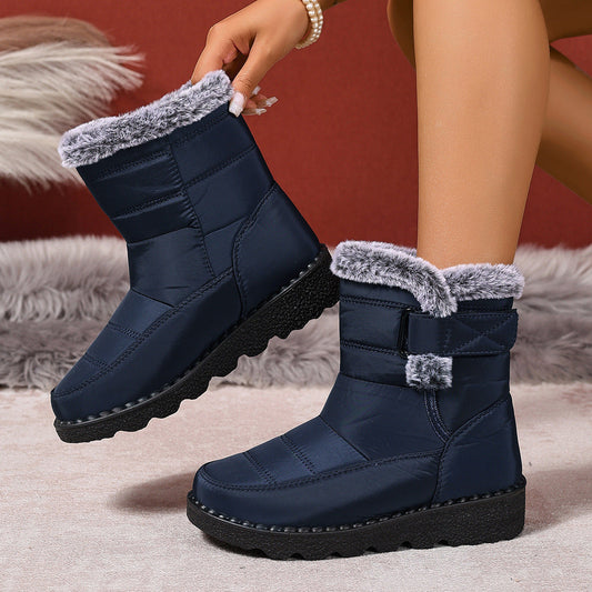 Plus size women's navy blue snow boots with fur lining and buckle detail