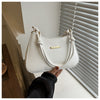 Women's high-end hand-held small white square bag with gold accents and single shoulder strap