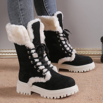 Black winter lace-up snow boots for women with white plush lining and chunky white soles