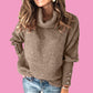 Women's lapel pullover knit sweater in brown cotton blend with buttoned sleeves and turtleneck collar