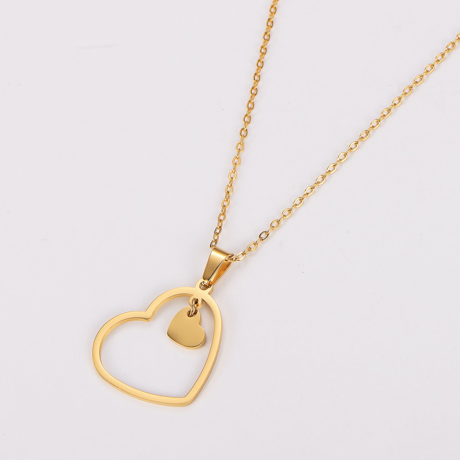 Double-heart stainless steel necklace with gold plating and O-link chain