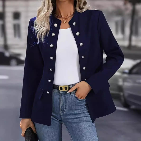Woman wearing dark blue winter fashion double breasted stand collar cardigan jacket with silver buttons and long sleeves
