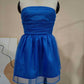 Blue tube top lace dress with mesh stitching and short skirt on mannequin