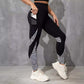 Women’s high waist color contrast patchwork sports leggings with pocket in black and white leopard print design