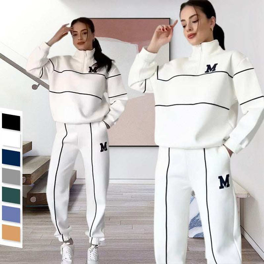 Women 2 piece white lounge sweatsuit with black stripes and letter M logo