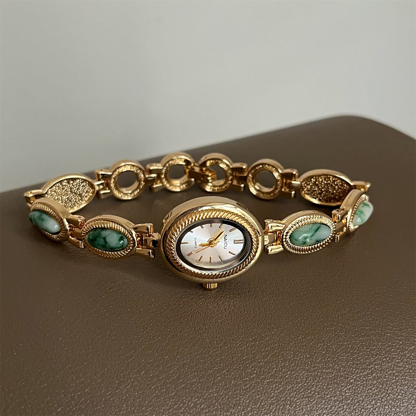Women's agate bead bracelet watch with gold alloy band and quartz analog movement
