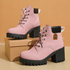 Plus size pink chunky heel Martin boots with thick black platform and front lace-up design