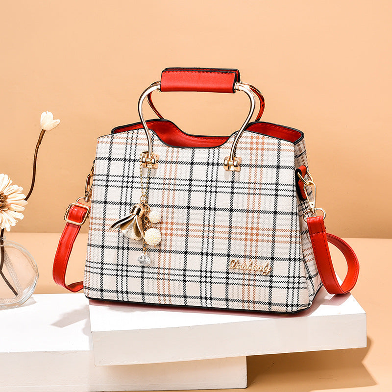 Large capacity fashion women's handbag with plaid design and red handles, medium-soft PU material, and sandwich zipper pockets.