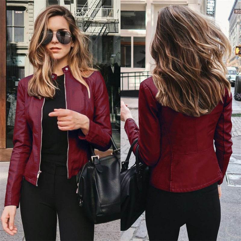 Woman wearing wine red autumn winter fashion leather PU jacket with zipper front and fitted design, urban casual style.