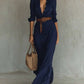 Elegant navy blue irregular long dress with belt and button lapel, perfect for office or daily wear
