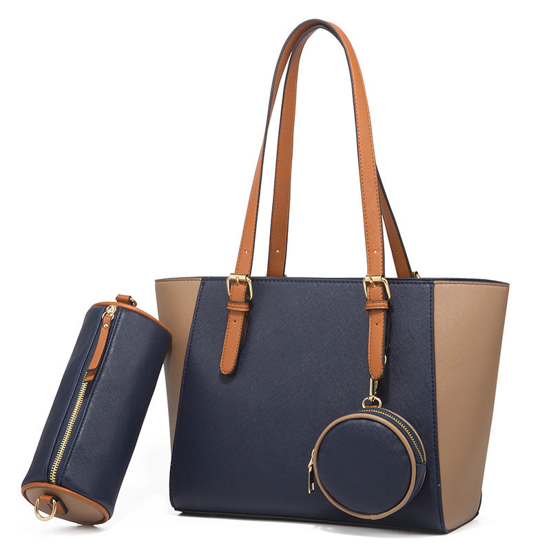 Large capacity three-in-one navy and brown Saffiano bucket bag with double shoulder straps and removable pouches