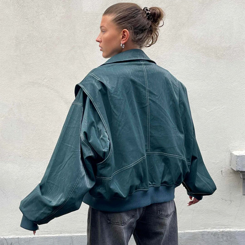 Woman wearing loose fashion lapel long sleeve zip-up jacket in dark green back view