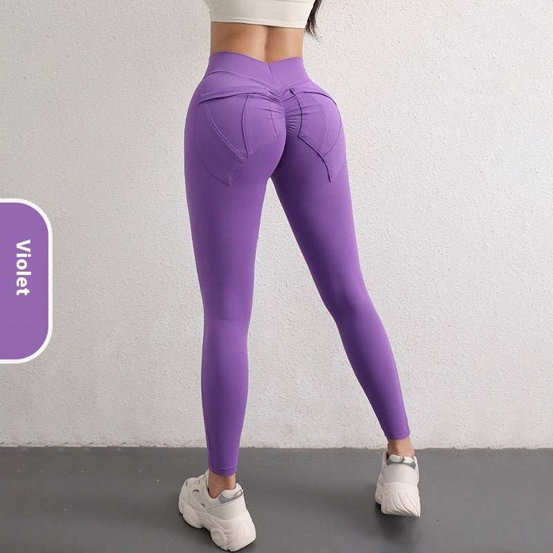 Women’s violet high waist hip lift yoga leggings with pockets for fitness and sports