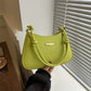 Women's high-end hand-held small square armpit bag in green PU material with knotted shoulder strap and gold accent detail