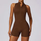 Women's brown sleeveless fitness yoga jumpsuit with front zipper and backless design