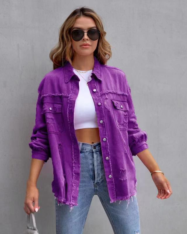 Woman wearing purple ripped shirt jacket with rolled sleeves and sunglasses, casual autumn spring top